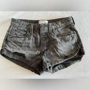 Distressed dark gray/faded black shorts